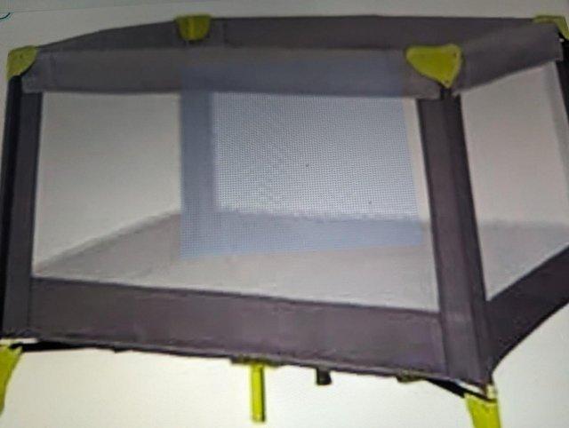 Preview of the first image of Babystart travel cot in grey and green.