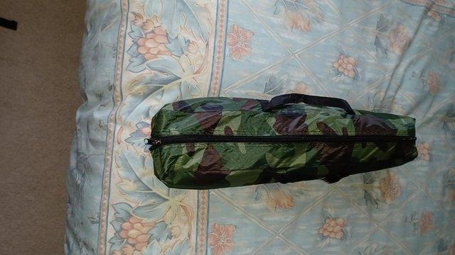 Preview of the first image of One person fishing tent shelter with carry case as new never.