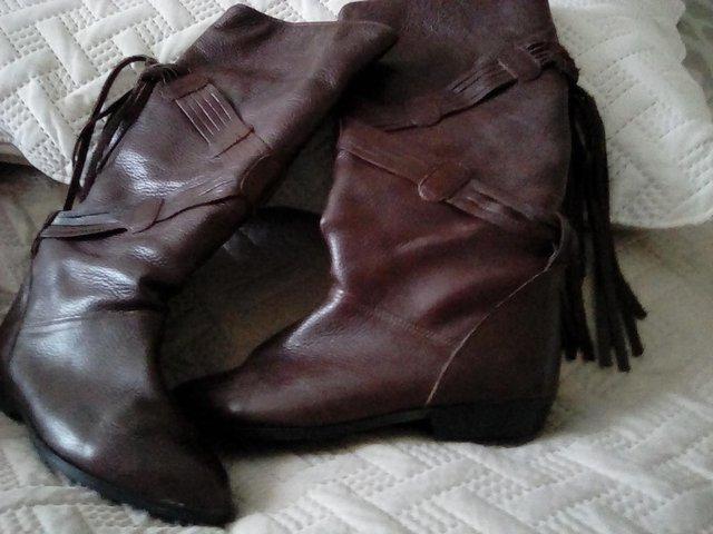 Preview of the first image of Ladies Brown leather fringed boots.