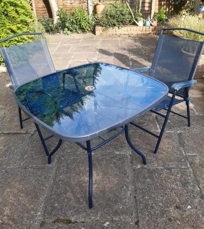 Image 2 of Glass Patio Table and 2 Folding Chairs