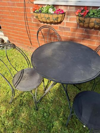 Image 2 of Heavy iron garden table with 4x chairs