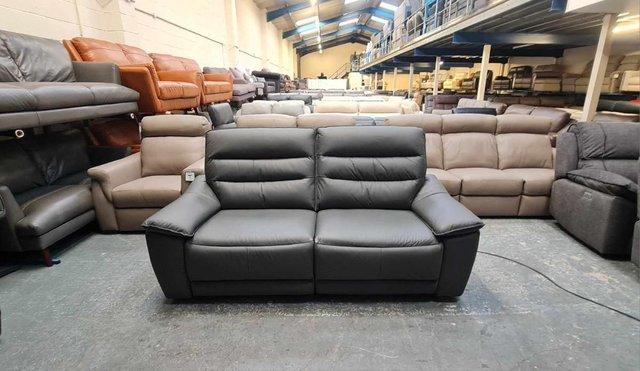 Preview of the first image of Carter grey leather electric recliner 3 seater sofa.