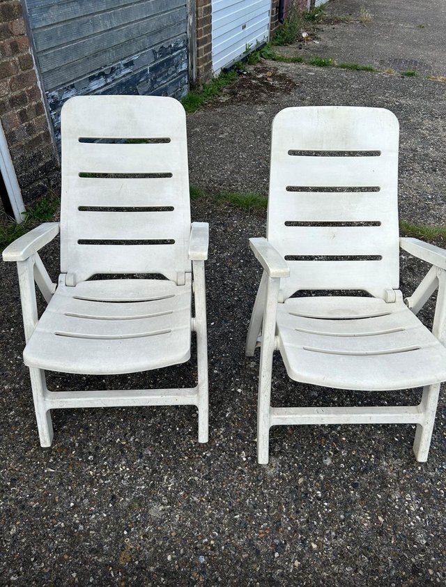 Preview of the first image of 2 reclining garden chairs.