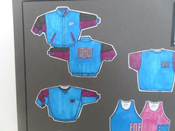 Image 1 of Sport apparel designs on boards ready to be manufactured.