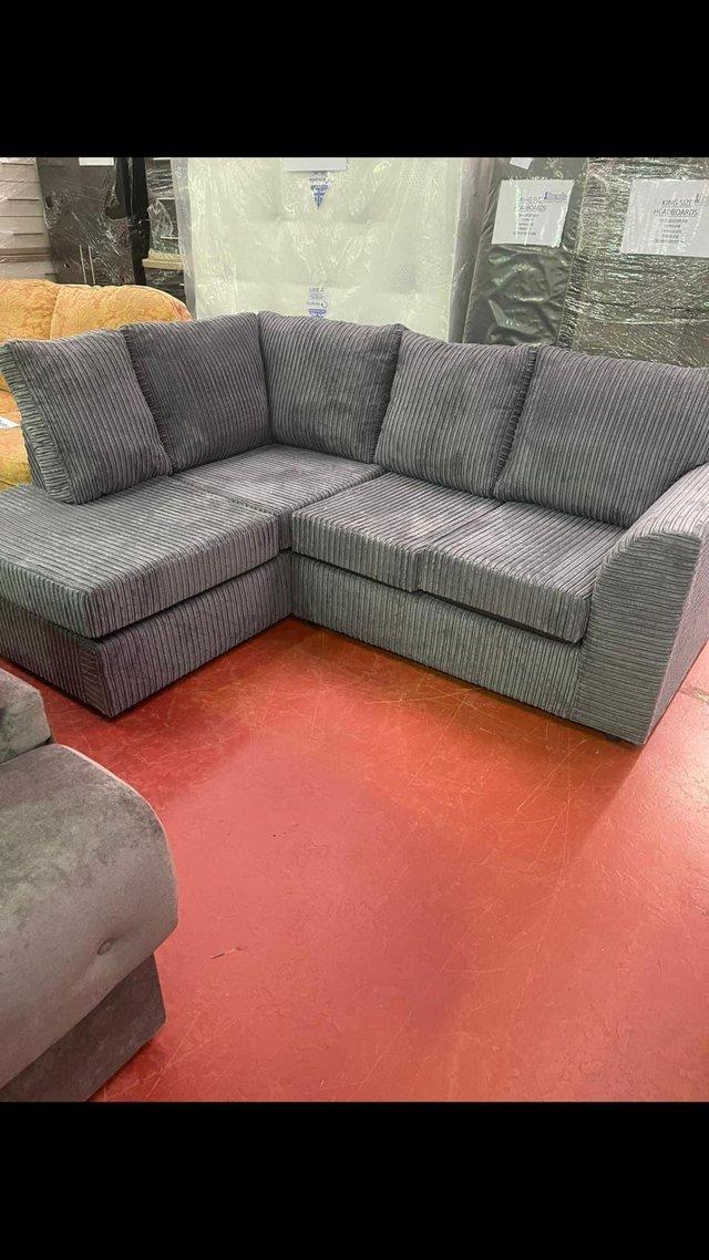 Preview of the first image of Byron corner sofa in jumbo grey cord fixed back.