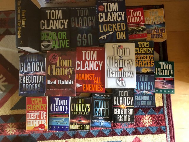 Preview of the first image of 18 Tom Clancy books, some hardback..