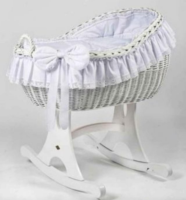 Preview of the first image of MJ Marks wicker crib with mattress, bedding and accessories.