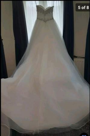 Image 3 of Designer wedding dress size S and Size M available