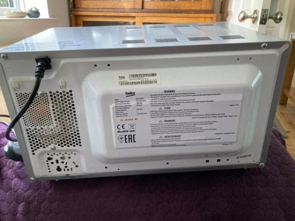 Image 1 of Microwave Beko, 1200w Silver light use only