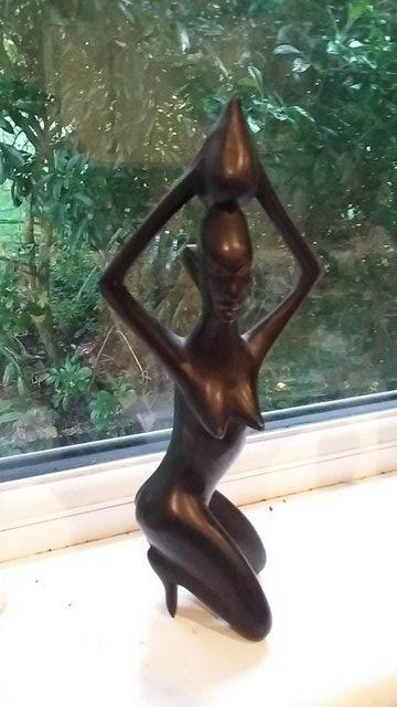 Preview of the first image of Vintage Ebony African Carved Wood Figure - approx. 8.5" x 4".