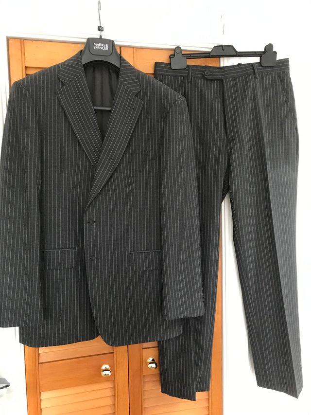 Preview of the first image of As new grey chalk stripe man’s suit.