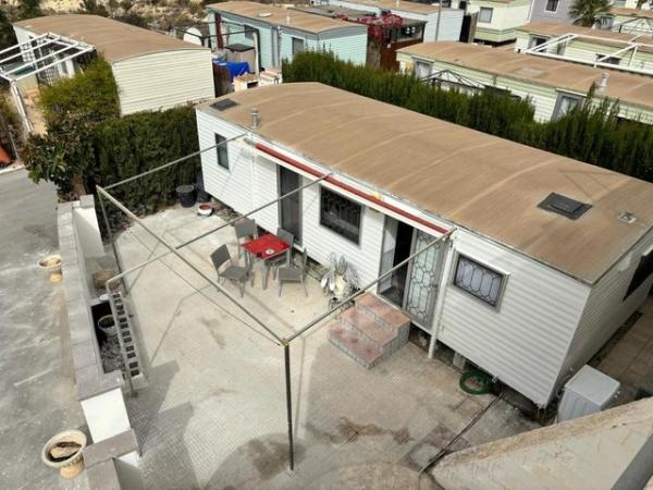 Image 1 of RS 1736 mobile home with communal pool and bar on site