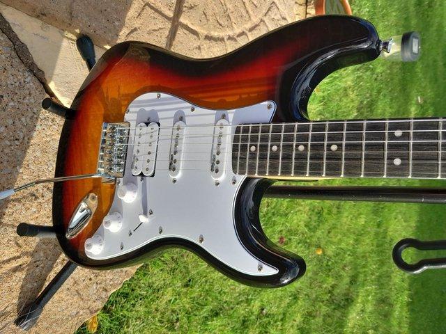 Preview of the first image of ARTIST. STRAT SHAPED GUITAR  6 STRING.also amp..