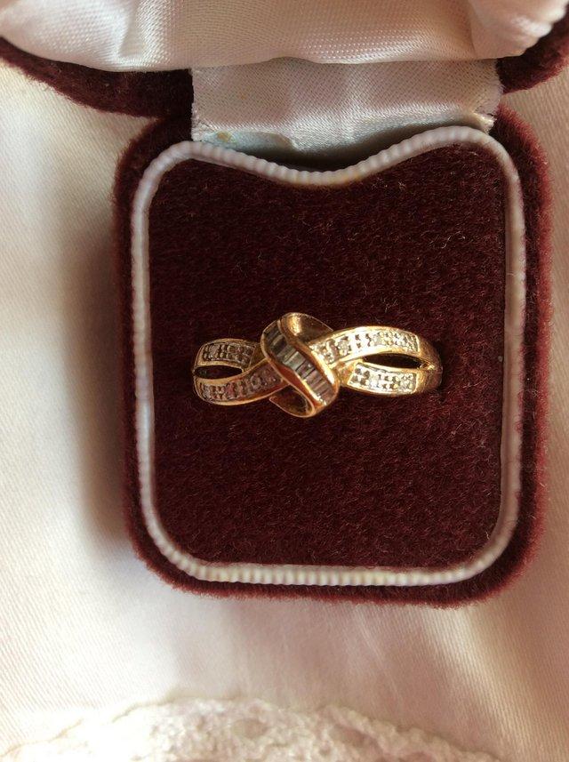 Preview of the first image of Vintage 10k yellow gold ‘ Knotted Ribbon’ ring.