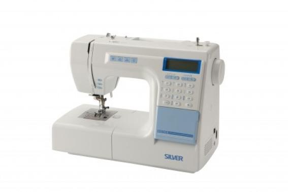 Image 1 of Silver 8000E Sewing Machine, as new condition.