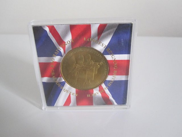 Preview of the first image of Queen Elizabeth II longest reigning monarch coin 2015.