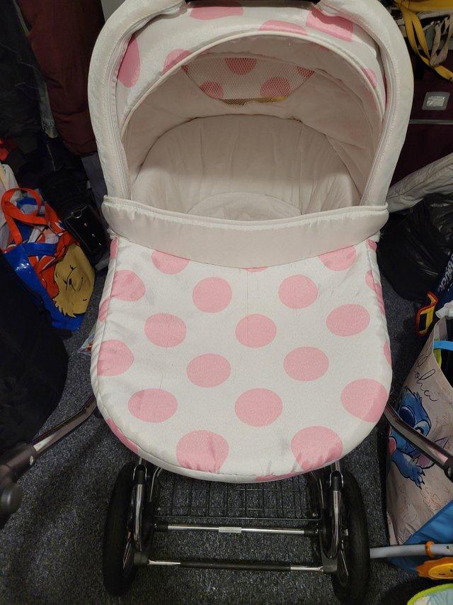 Preview of the first image of Leebruss Pram with Bassinet and chair.
