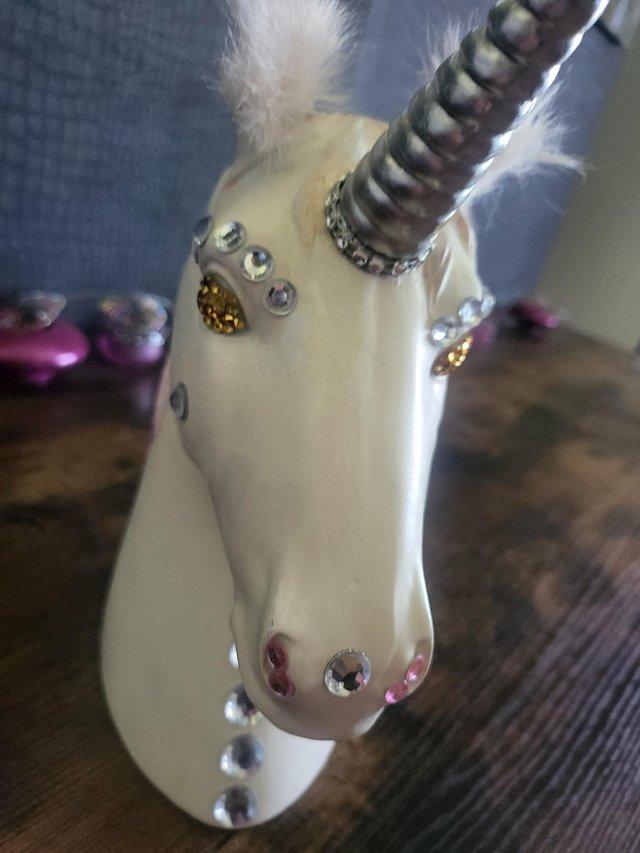 Preview of the first image of Jewel/ fur unicorn head ornament see below.