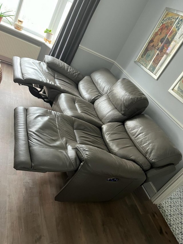 Preview of the first image of 3 Seater Leather Recliner Sofa with Power Headrests.