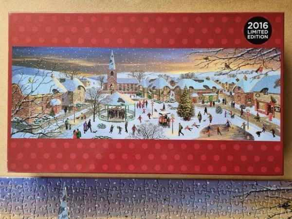 Image 2 of 1000 piece jigsaw called A FESTIVE CHRISTMAS VILLAGE BY W H