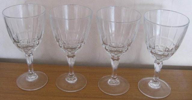 Preview of the first image of Four matching Wine Glasses, 15cm tall.