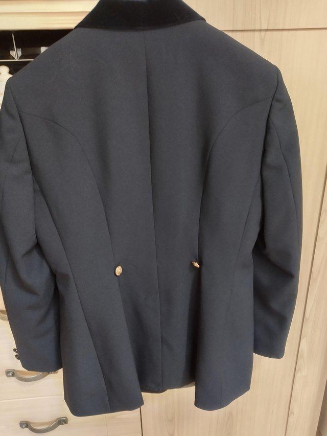 Preview of the first image of Navy show jacket in excellent condition.