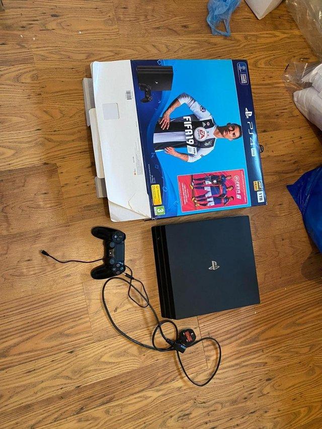 Preview of the first image of PS4 Pro Playstation Pro 1TB with box good condition.