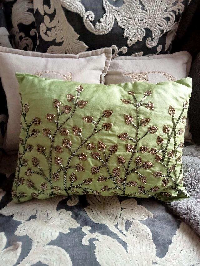 Preview of the first image of Green Embellished Pure Linen Cushion..