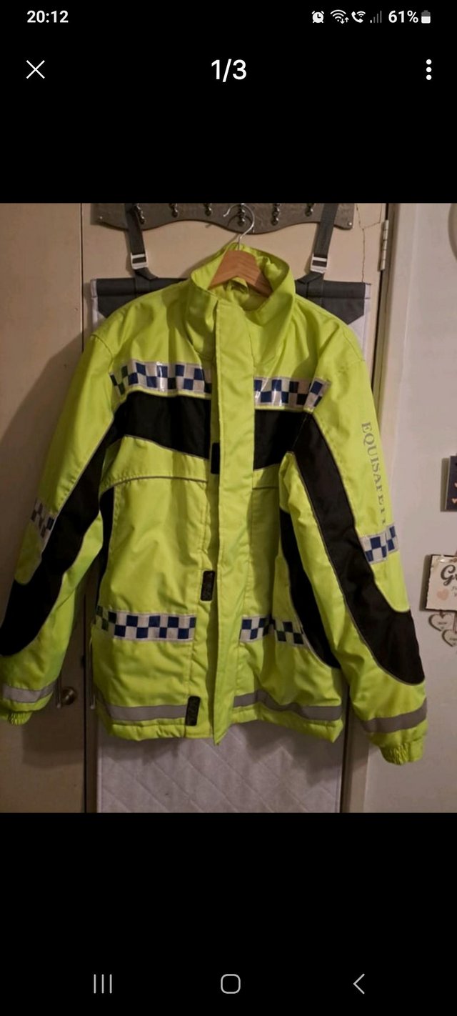 Preview of the first image of Short hi viz horse riding jacket.