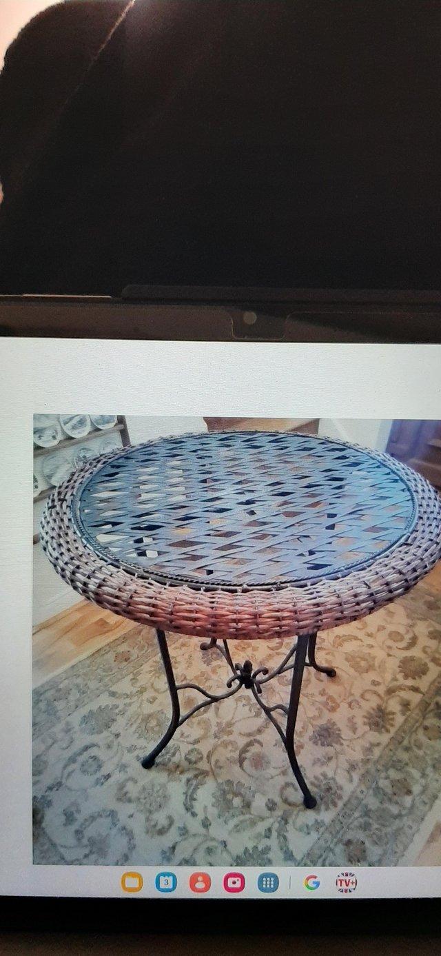 Preview of the first image of Small-sized Wicker and Cast Iron Conservatory Table.