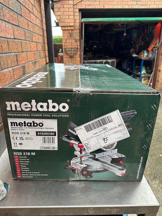 Preview of the first image of New in the box Metabo KGS compound mitre saw.
