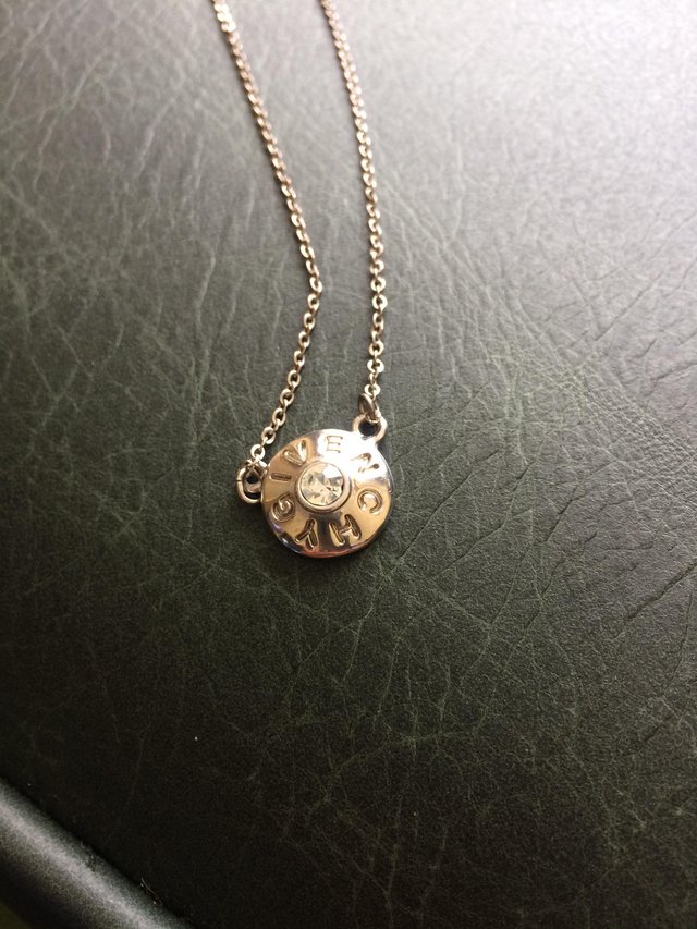 Preview of the first image of GIVENCHY NECKLACE SILVER TONE.