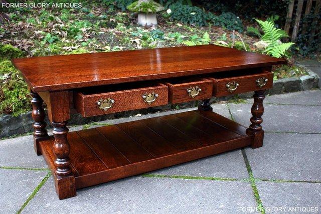Image 34 of TAYLOR & Co STRESSED OAK THREE DRAWER POTBOARD COFFEE TABLE