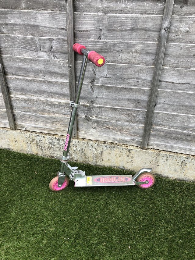 Preview of the first image of Two used pink girls scooters.
