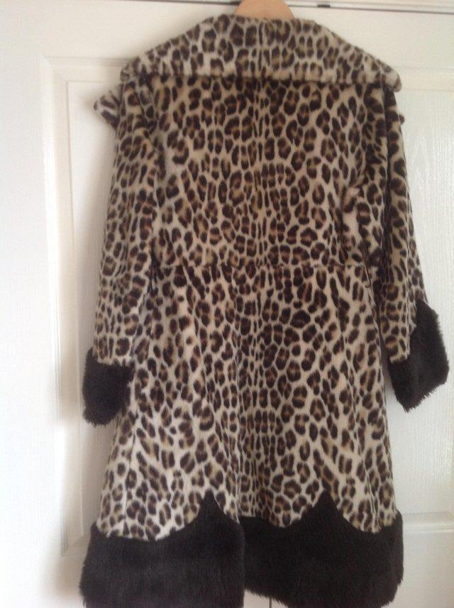 Preview of the first image of Leopard design print faux fur coat.