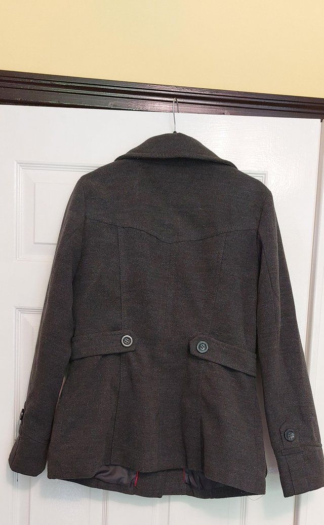 Preview of the first image of H&M grey winter coat size 12.