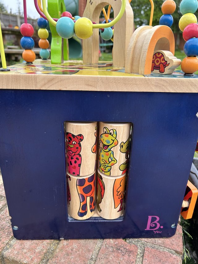 Preview of the first image of B. Toys Zany Zoo Wooden Activity Cube Assortment.
