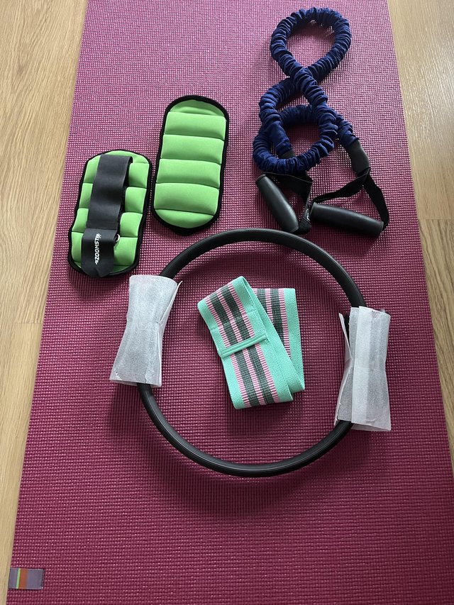 Preview of the first image of Yoga mat, ankle weights, resistance bands, pilates ring.