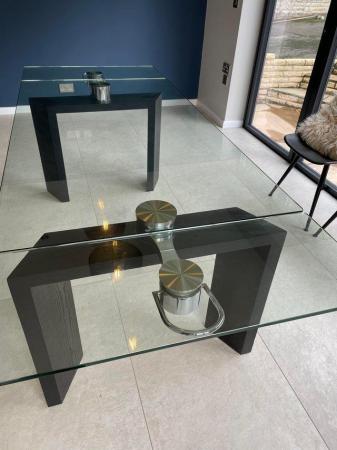 Image 1 of Glass and dark grain wood extending dining table
