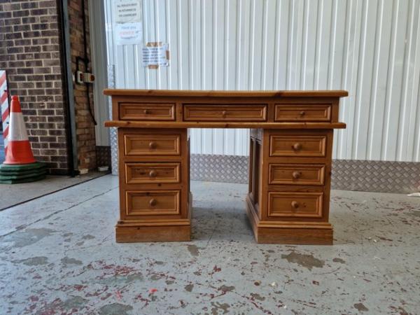 Image 2 of A Substantial Wooden Desk with Drawers.