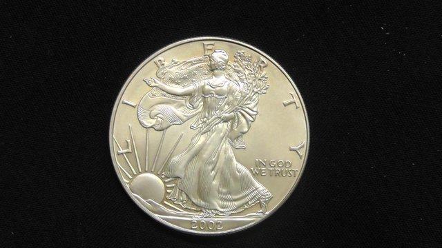 Preview of the first image of Four Genuine US Silver Eagles For Sale as one lot..