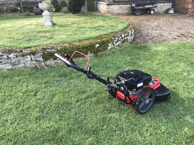Preview of the first image of Nearly new Cobra wheeled strimmer..