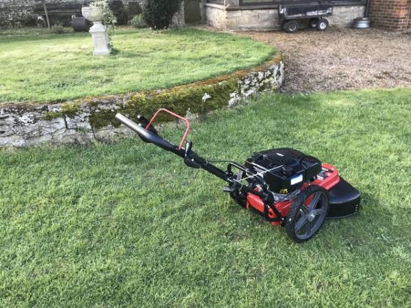 Image 1 of Nearly new Cobra wheeled strimmer.