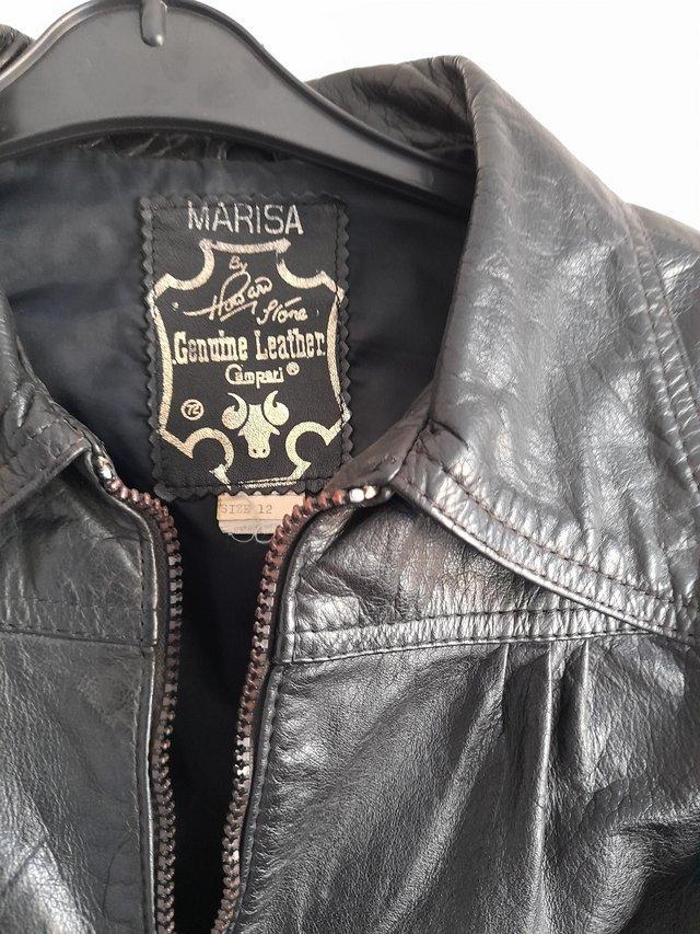 Preview of the first image of Ladies/Girls black leather bomber jacket..