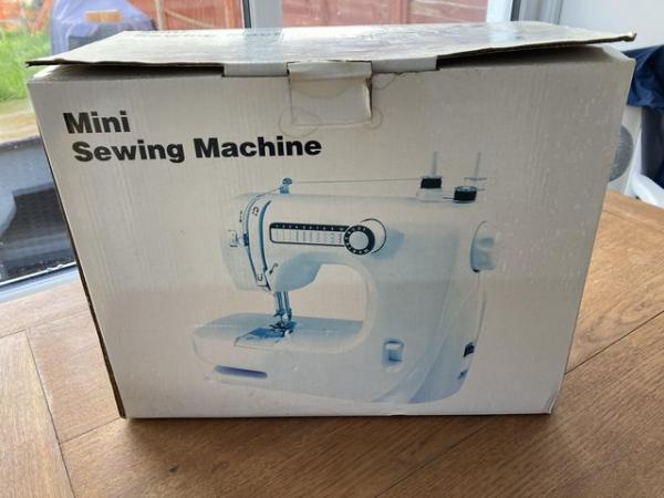 Image 3 of Mini sewing machine. Good Condition with box and operators m