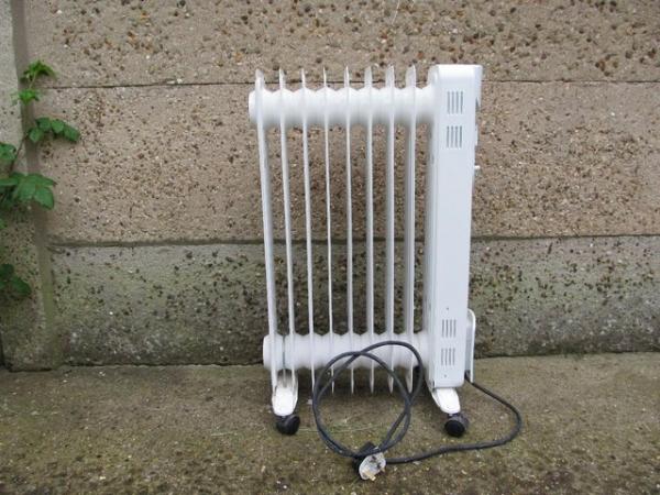 Image 1 of Oil filled Kingfisher Electric Radiator on wheels.