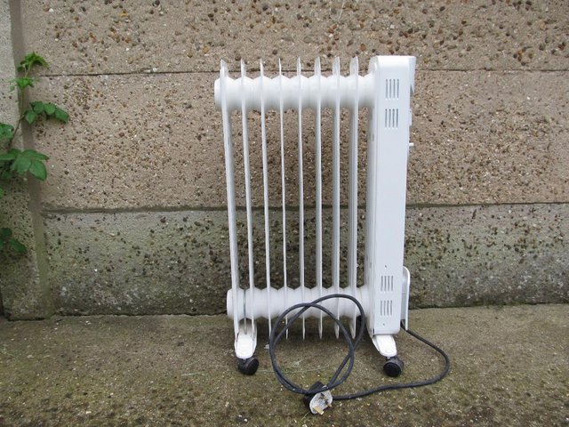 Preview of the first image of Oil filled Kingfisher Electric Radiator on wheels..