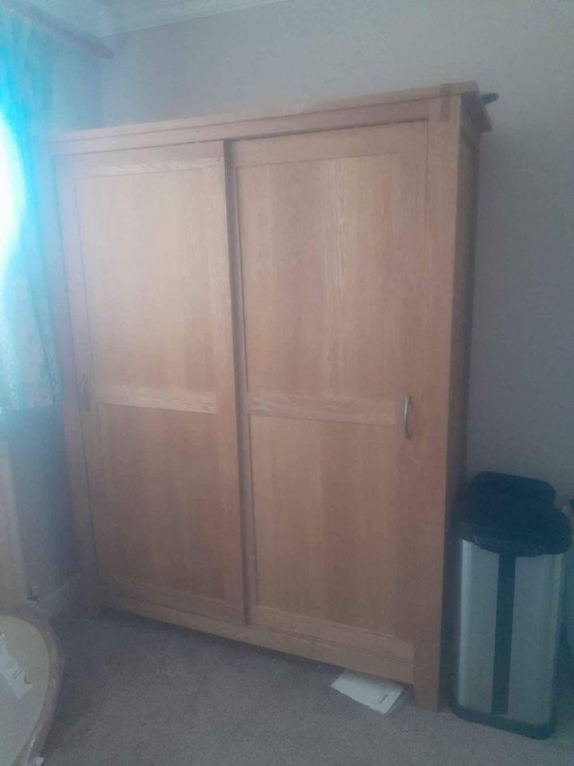 Preview of the first image of Large Solid oak wardrobe.