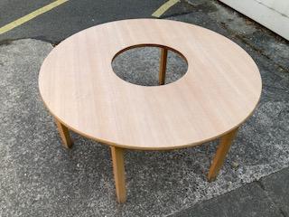 Preview of the first image of A TRULY UNIQUE TABLE WITH A HOLE IN MIDDLE.