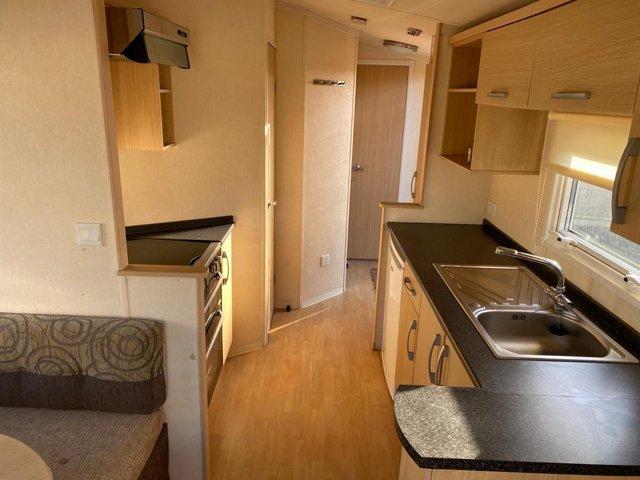 Preview of the first image of Beautiful 2011 Swift Burgundy static caravan for sale.